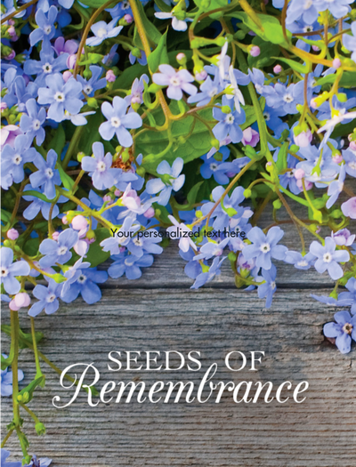 Floral design with 'Seeds of Remembrance' text on a wooden background