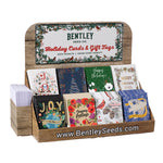 Bentley Seed Co. holiday seed packet cards and gift tags with a display.