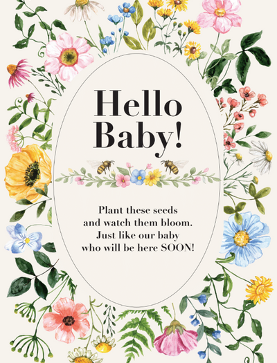 Wildflower seed packet featuring elegant text that reads “Hello Baby,” along with the heartfelt message, “plant these seeds and watch them bloom just like our baby who will be here soon,” each packet is beautifully framed by a delicate wreath of illustrated wildflowers.