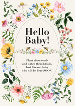 Wildflower seed packet featuring elegant text that reads “Hello Baby,” along with the heartfelt message, “plant these seeds and watch them bloom just like our baby who will be here soon,” each packet is beautifully framed by a delicate wreath of illustrated wildflowers.