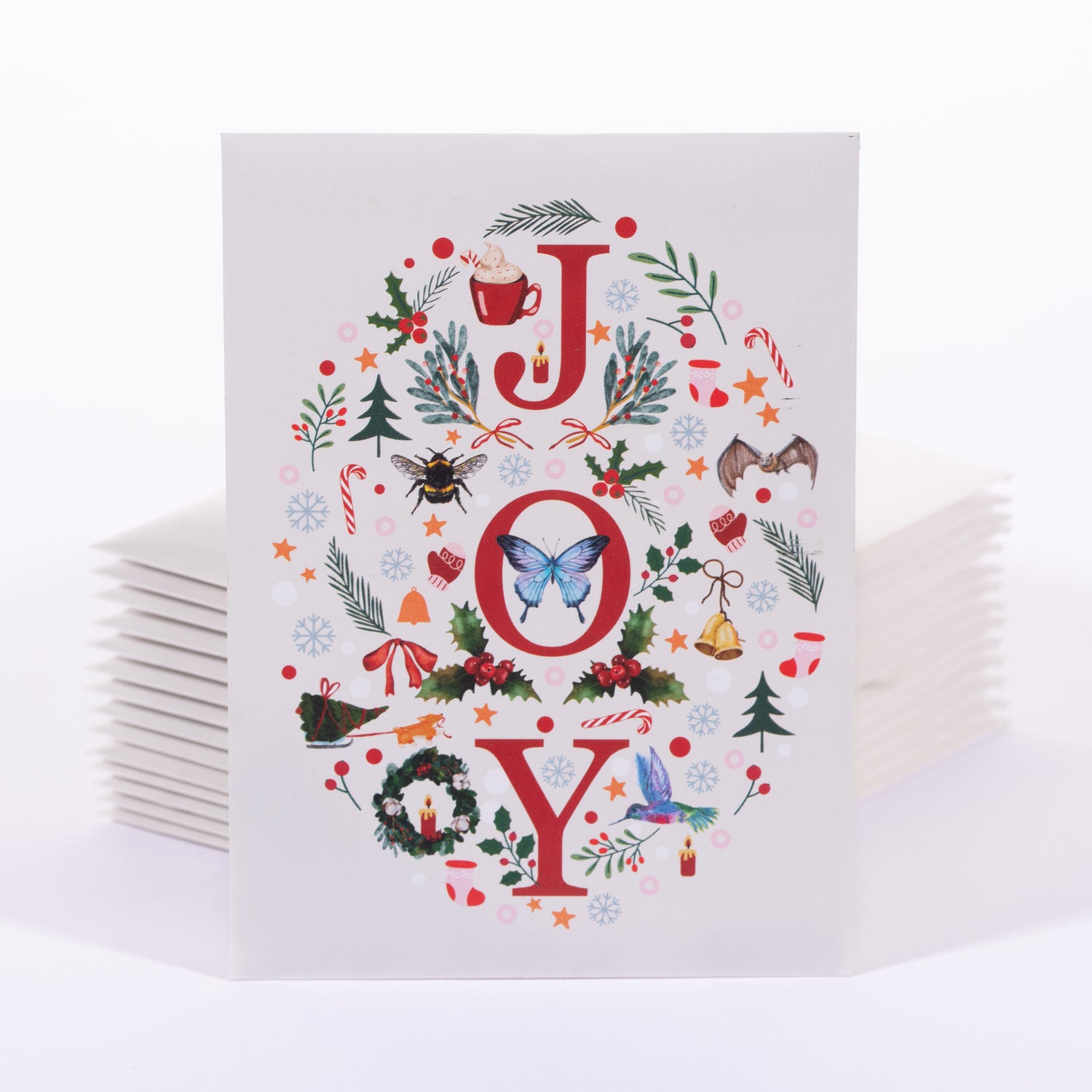 Set of 25 Christmas-themed cards with decorative 'JOY' text on a white background