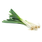 Fresh leeks on a white background.