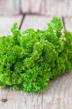 Moss Curled Parsley This variety of parsley features lovely curled leaves that are ideal for garnish. It has a mild flavor and grows well in containers both inside and outside! Bentley Seed